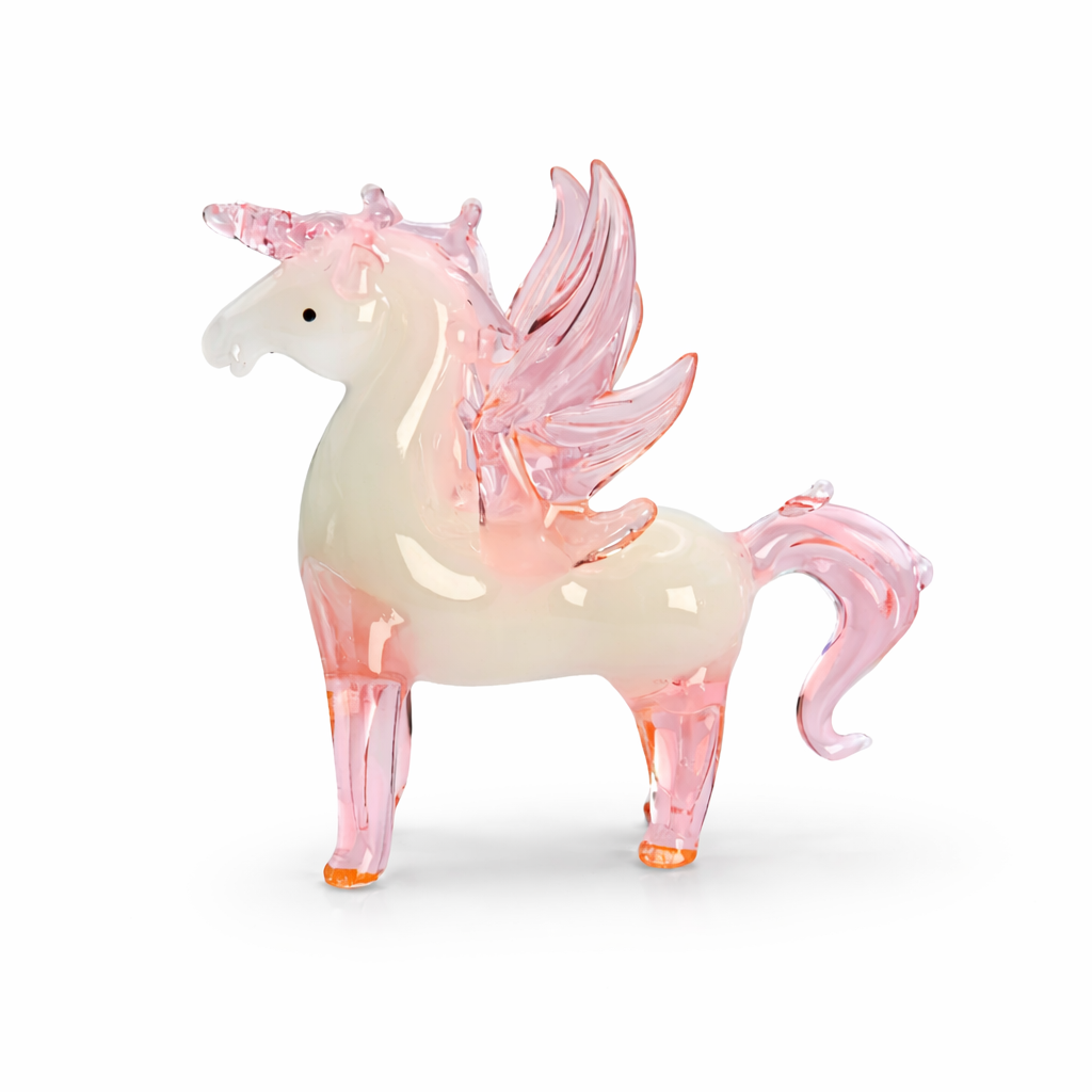 Unicorn figurine with pink and white colors on a white background